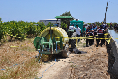 Mersin'de feci kaza: Kıyafeti traktöre dolandı