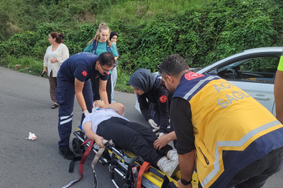 Otomobille çarpışan bisikletli çocuğun dişi aracın üzerinde kaldı