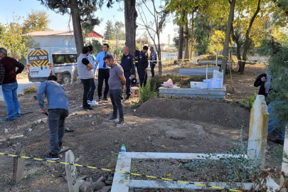 Cenazenin defnedildiği alanda 1100 sikke bulundu